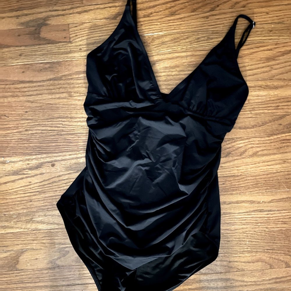 Black one piece. Bought on Amazon